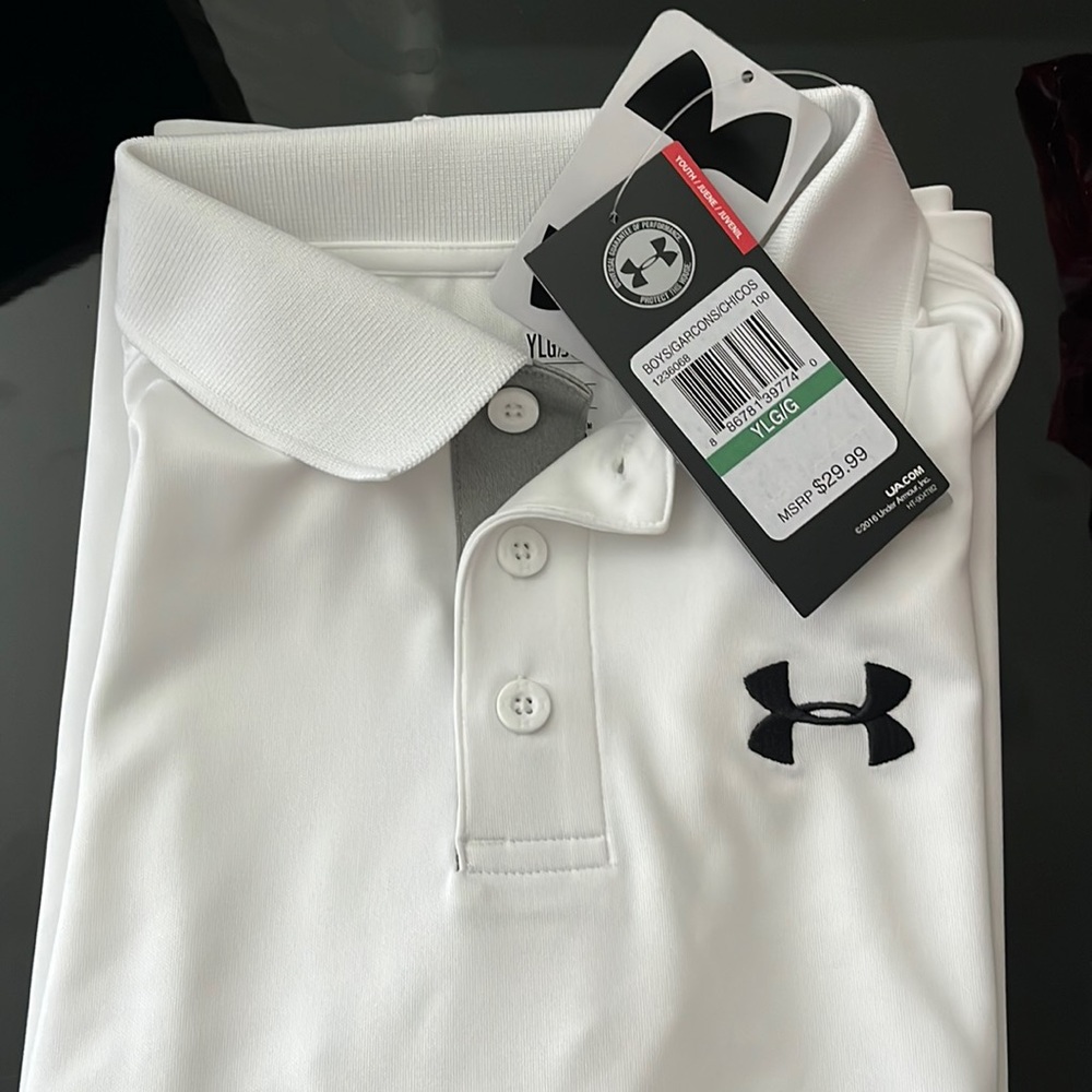 Brand-new with tags boys White Under Armour polo shirt short sleeves use large.